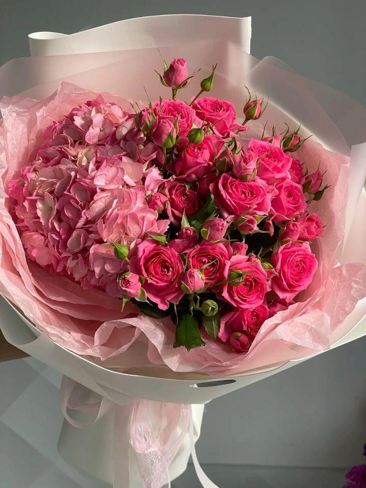 Professional floral arrangement in modern corporate setting